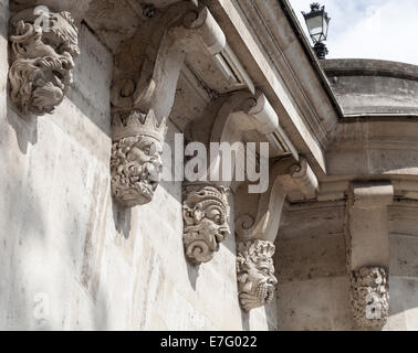 Decorative sculptures on the Pont Neuf, New Bridge across the Seine river in Paris, France Stock Photo