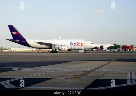 Federal Express cargo jet on the runway preparing for take-off at Burbank airport in California Stock Photo