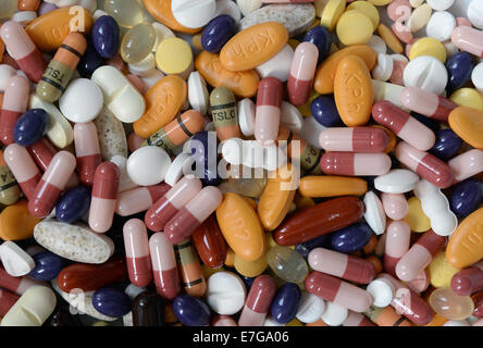 Tablets and pills on a table, 23 July 2014 in Hamburg. Stock Photo