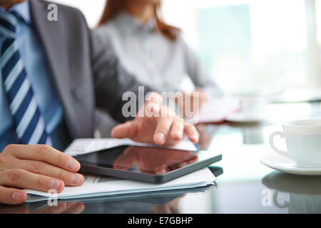Male hand touching screen of digital tablet Stock Photo