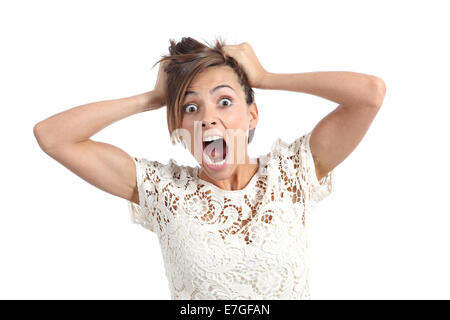 Front view of a scared woman screaming with hands on head isolated on a white background Stock Photo