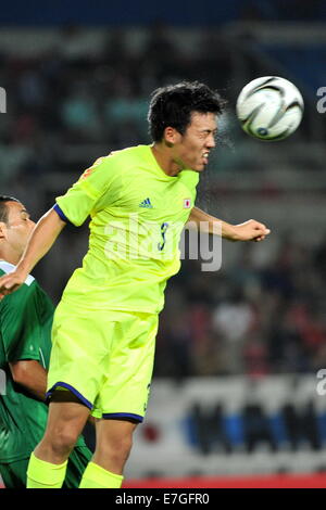 Incheon, South Korea. 17th Sep, 2014. Endo Wataru of Japan heads for the ball during the men's football first round group D match against Iraq at the 17th Asian Games in Incheon, South Korea, on Sept. 17, 2014. Credit:  Gao Jianjun/Xinhua/Alamy Live News Stock Photo