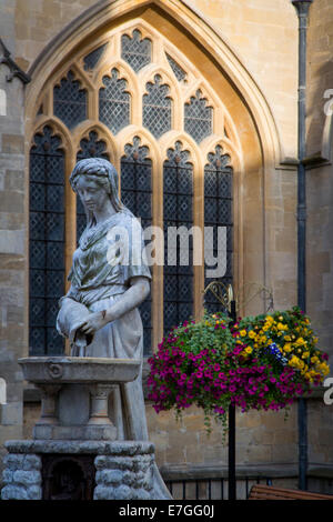 Woman at the Well statue outside the Bath Cathedral, Bath, Somerset, England Stock Photo