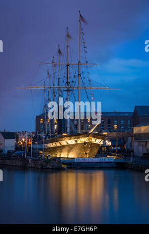 Twilight over Brunel's SS Great Britain - worlds first steam-powered passenger liner, now a museum in dry dock, Bristol, England Stock Photo