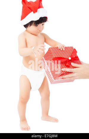 cute  baby in Santa cap receive a gift box over white background Stock Photo