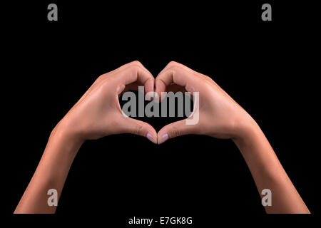 Girl hand in heart isolated on black background Stock Photo