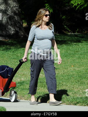 Heavily pregnant Jenna Fischer takes a morning stroll with son Weston, riding in a  Radio Flyer wagon, around Glendale. According to reports 'The Office' actress is due to give birth in late spring.  Featuring: Jenna Fischer Where: Glendale, California, United States When: 15 Mar 2014 Stock Photo