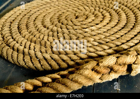 neatly wound ship rope in a circle Stock Photo - Alamy