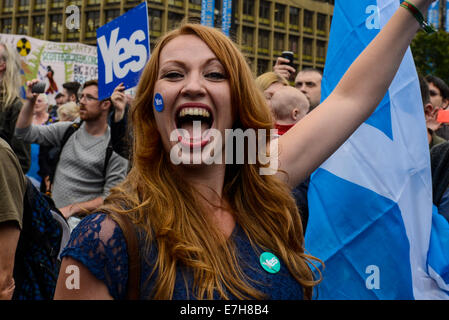 Glasgow, Scotland, UK. 17th Sept, 2014. Hundreds of people attend a "Yes Scotland Campaign" in George Square, Glasgow with banners and placards, there are also featured speakers as well as live music. The country goes to the polls on the 18th of September 2014 to decide whether Scotland should be an independent country or remains in the United Kingdom. Credit:  Martin Alan Smith/Pacific Press/Alamy Live News Stock Photo
