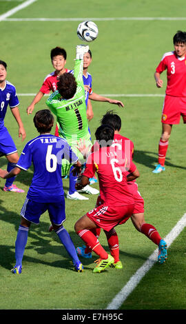 Incheon, South Korea. 18th Sep, 2014. Tsai Ming Jung (C) of Chinese Taipei vies for the ball during the women's football first round group B match against China at the 17th Asian Games in Incheon, South Korea, on Sept. 18, 2014. China won 4-0. Credit:  Ye Pingfan/Xinhua/Alamy Live News Stock Photo