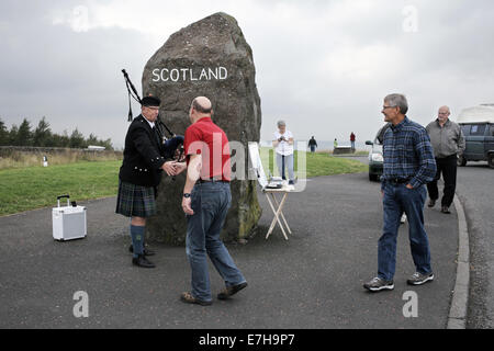 Carter Bar, Scotland, UK. 16th Sep, 2014. A bag piper plays for ...
