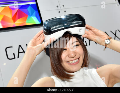 Makuhari, Japan. 18th Sep, 2014. South Korea's Samusung shows Galaxy head mount display at the Tokyo Game Show which opens at the Makuhari Messe, east of Tokyo, on Thursday, September 18, 2014. The annual exhibition features nearly 750 games from 400 exhibitors for every type of console, smartphone and tablet. The Asias biggest gaming event is expected to draw more than 200,000 visitors on the four-day run. Credit:  Natsuki Sakai/AFLO/Alamy Live News Stock Photo