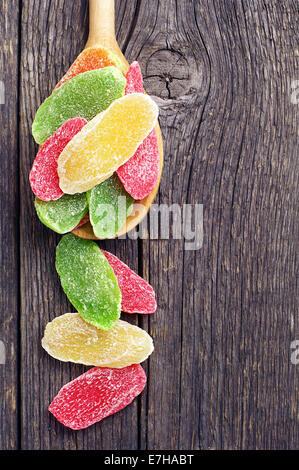Candied pineapple on vintage wooden background Stock Photo