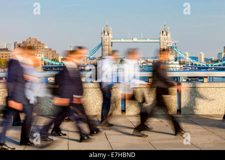 City of London Workers Walking Across London Bridge, London, England Stock Photo