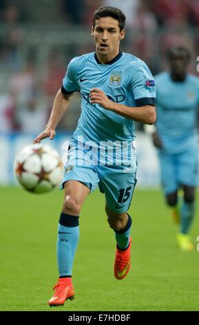 Munich, Germany. 17th Sep, 2014. Manchester 's Jesus Navas controls the ball during the UEFA Champions League Group E soccer match between FC Bayern Munich and Manchester City in Munich, Germany, 17 September 2014. Photo: Sven Hoppe/dpa/Alamy Live News Stock Photo