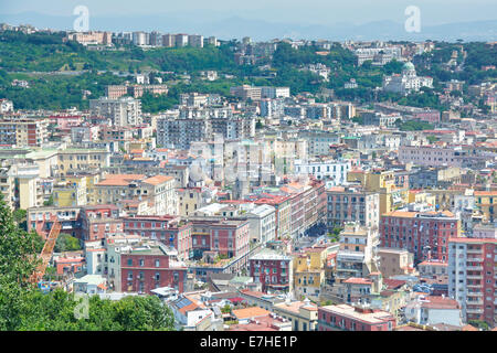 Looking down from above on Naples homes in urban landscape & cityscape of Italian apartment block housing on hillside Napoli vista Campania Italy EU Stock Photo