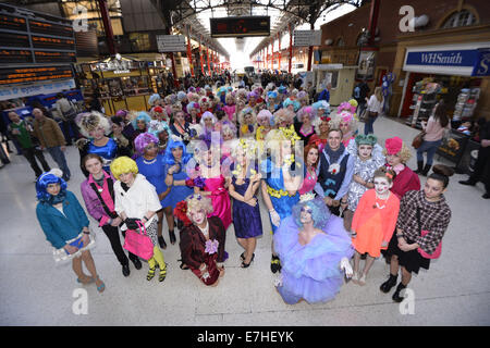 Members of the public turn up at London's Marylebone Station dressed as Effie Trinket as part of 'The Hunger Games: Catching Fire' Capitol Costume Competition in which the winner gets to attend the 'Mokingjay: Part 1' premiere  Featuring: Effie Trinkets Where: London, United Kingdom When: 16 Mar 2014 Stock Photo