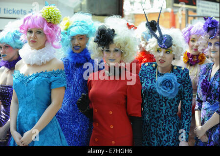 Members of the public turn up at London's Marylebone Station dressed as Effie Trinket as part of 'The Hunger Games: Catching Fire' Capitol Costume Competition in which the winner gets to attend the 'Mokingjay: Part 1' premiere  Featuring: Effie Trinkets Where: London, United Kingdom When: 16 Mar 2014 Stock Photo