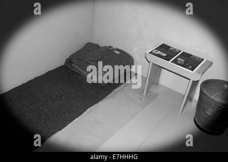 Black and white photograph of a replica model of Nelson Mandela's prison cell that was on show at the V & A Waterfront. Stock Photo