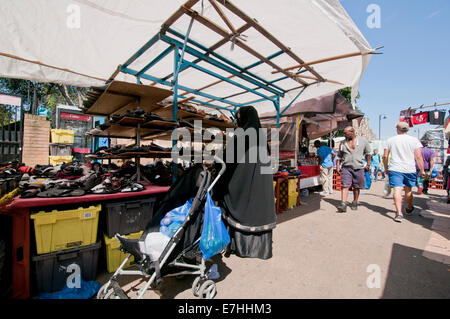 Shoe stall in East Lane market stalls in South London Stock Photo