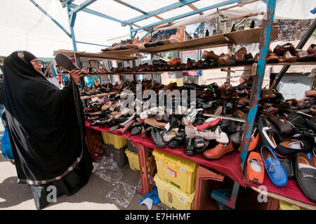 Shoe stall in East Lane market stalls in South London Stock Photo