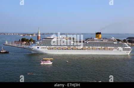 A Costa cruise ship Thomson Majesty leaves the harbour and passes close to the island San Giorno Maggiore in Venice, Germany, 08 September 2014. A debate is currently going on about the passage of cruise ships this close to the city and the dangers for the environment this poses. The huge cruise ships are supposed to using the route close to Giudica in the future but rater the one closer to the train station, which is further from the city. Channels would have to be deepened and widened for this solution, however. Photo: Waltraud Grubitzsch -NO WIRE SERVICE-