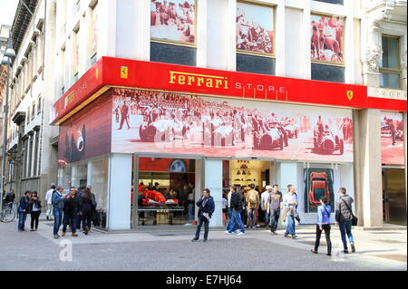 People outside the Ferrari Store in Milan, Italy Stock Photo