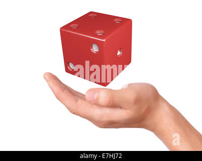 image of hand holding red dice isolated on white background Stock Photo