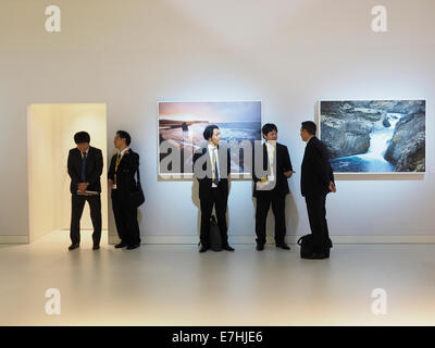 Japanese camera manufacturer representatives visiting the Photokina in Cologne, Germany Stock Photo