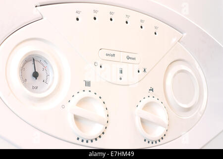 The controls on a domestic central heating and hot water combination boiler Stock Photo