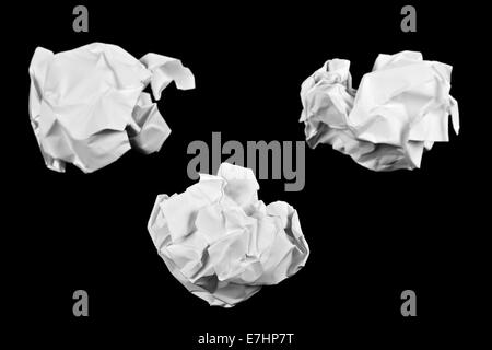 Crumpled paper ball isolated on a black background Stock Photo