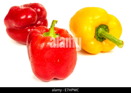 Yellow and red paprika on a white background Stock Photo