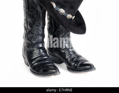Black Lizard Cowboy Boots and Hat with Concho Hatband. Stock Photo