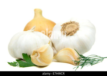 Garlic with onion, parsley and dill isolated on white background Stock Photo