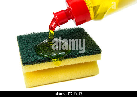 Yellow kitchen sponges and bottle of dishwashing liquid isolated over white background Stock Photo
