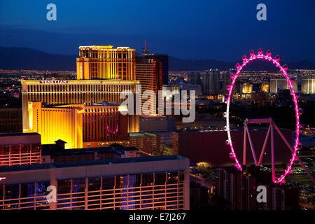 View of Las Vegas and High Roller giant ferris wheel at dusk, from Eiffel Tower replica at Paris Hotel and Casino, Las Vegas, Ne Stock Photo