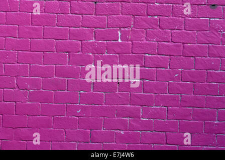 Pink painted brick wall Stock Photo