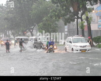 Quezon City, Philippines. 19th Sep, 2014. Typhoon Mario (international name: Typhoon Fung Wong) brought severe flooding in Quezon City Credit:  Sherbien Dacalanio/Alamy Live News Stock Photo