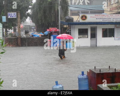 Quezon City, Philippines. 19th Sep, 2014. Typhoon Mario (international name: Typhoon Fung Wong) brought severe flooding in Quezon City Credit:  Sherbien Dacalanio/Alamy Live News Stock Photo