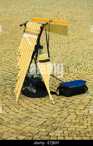 Musical wind instrument, pan flute outdoor on street. Folk music Stock Photo