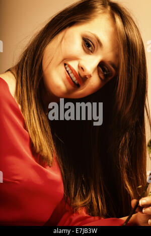 Portrait beautiful young fashion woman teen girl in red dress, old color, sepia tone Stock Photo