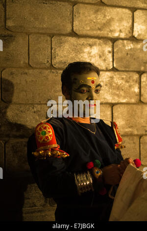 Kathakali dancer in full makeup waiting for his performance, Varkala, Kerala, South India, India Stock Photo