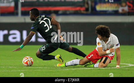 Salzburg, Austria. 18th Sep, 2014.Salzburg's Andre Ramalho (r) vies for the ball with Celtic's Mubarak Wakaso during the Europa League soccer match between Red Bull Salzburg vs FC Celtic Glasgow in Salzburg, Austria, 18 September 2014. Credit:  dpa picture alliance/Alamy Live News Stock Photo