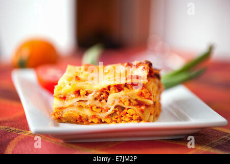 Fresh homemade Lasagne layout on a plate Stock Photo