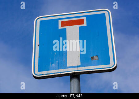 Dead-end road sign against a blue sky Stock Photo