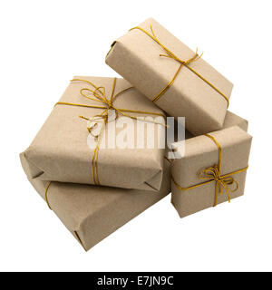 Gift wrapped in brown paper. Isolated on a white background. Stock Photo