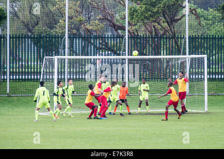 Football Match, The Players In The Penalty Area Concentrate On The 