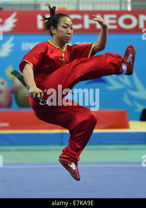 Incheon, South Korea. 20th Sep, 2014. Kojima Erika of Japan performs during the women's nandao of Wushu competition at the 17th Asian Games in Incheon, South Korea, Sept. 20, 2014. Credit:  Xie Haining/Xinhua/Alamy Live News Stock Photo