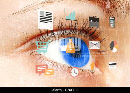 Woman blue eye looking at digital virtual screen with flat business icons close-up Stock Photo