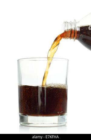 Cola pouring into glass on white background Stock Photo